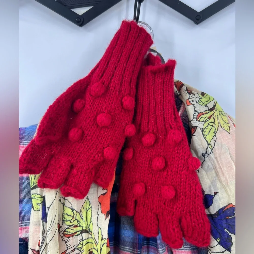 Wooden ships popcorn, fingerless glove with red raised Swiss dot bobble